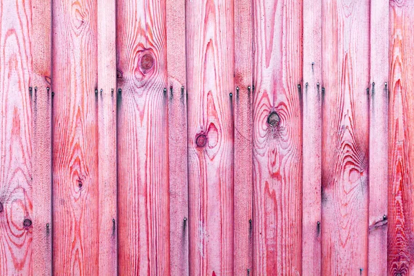 Fragment ogrodzenie drewniane. Drewniane deski jako tło z kopii przestrzeni. Drewniane deski rustykalne tekstura tło różowy. — Zdjęcie stockowe