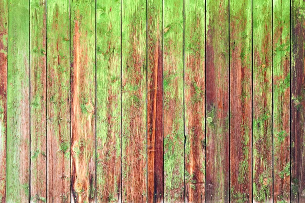 Fragment of old rustic derevyannogozabora. Old peeling paint green. — Stock Photo, Image