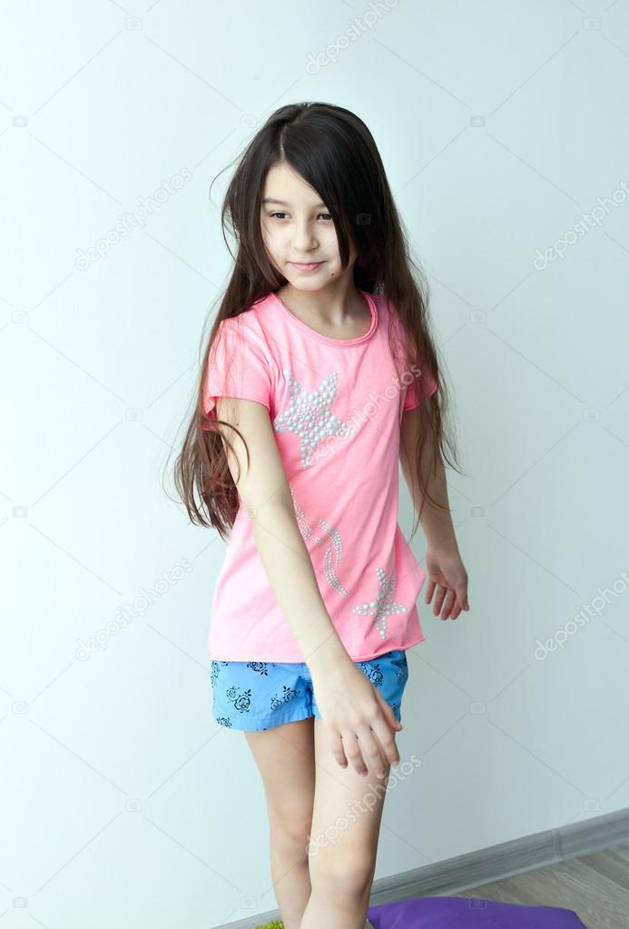 Little girl with long hair dancing Stock Photo by ©Mukhomedianova 105874856 Little girl with long hair dancing Stock Photo by ©Mukhomedianova 105874856