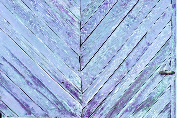 Houten planken als achtergrond. De textuur van het hek. Vintage effect. Houten planken diagonaal blauw. Oude schilferende verf. Kopieerruimte. — Stockfoto