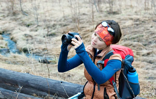 Woman tourist. Trekking with a camera. — Stock Photo, Image