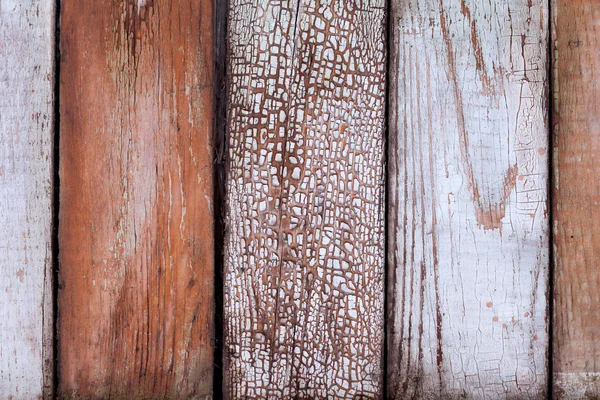Vieilles planches en bois minables avec fond de peinture fissurée — Photo
