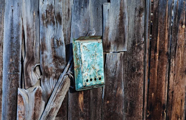 Old wooden wall texture or background with copy space. Wooden old boards with a box for letters. Mailbox. — Stock Photo, Image