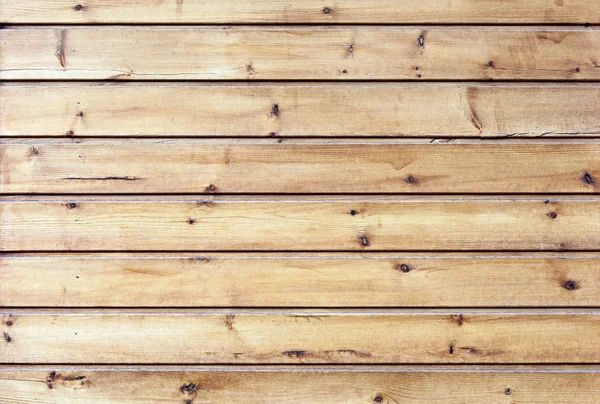 Les murs sont faits de planches de bois avec des traces de peinture. La texture des planches de bois comme fond avec une copie de l'espace — Photo