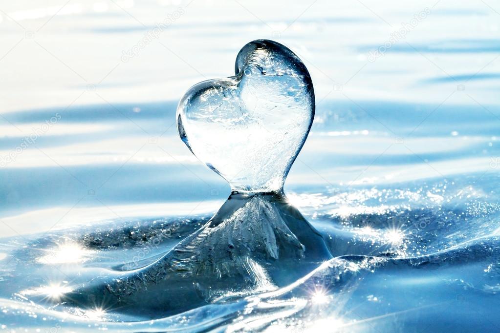 Icicle in the form of heart on the ice of Lake Baikal. Cold hear