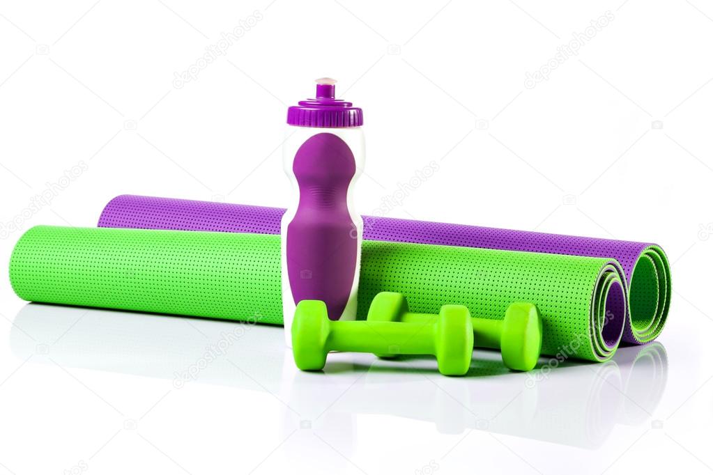 Yoga mat in a roll. Two  dumbbells. water bottle. 