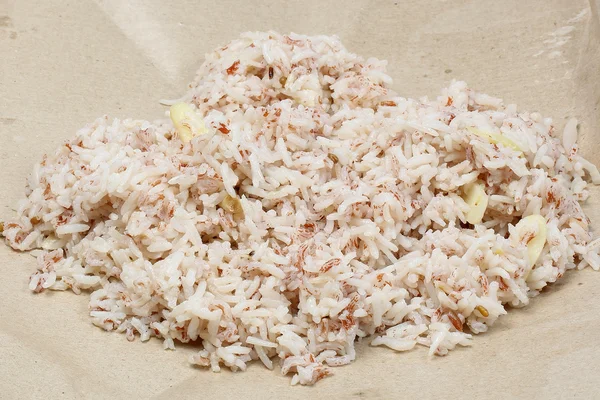Nasi Dagang rode rijst gekookt met kokosmelk — Stockfoto