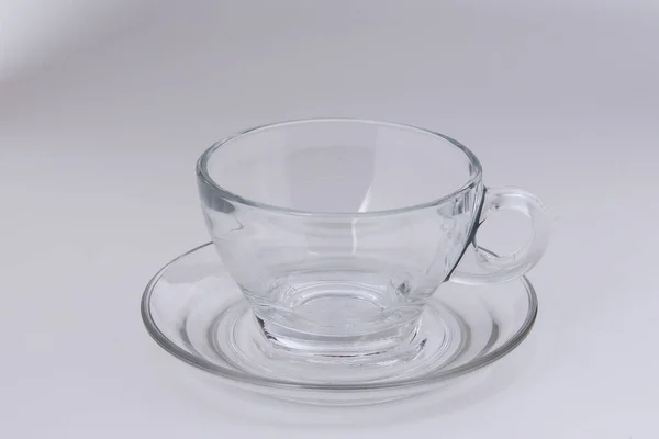 Empty Transparent Glass See Coffee Tea Cup Saucer White Background — Stock Photo, Image