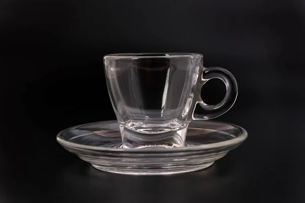 Empty Transparent Glass See Coffee Tea Cup Saucer Black Background — Stock Photo, Image
