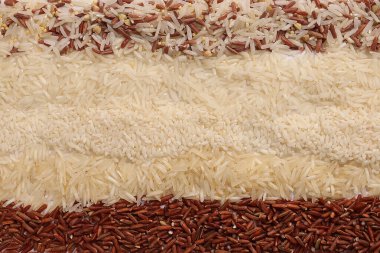 Varity mix long grain basmati medium grain yasemin short grain pilav risotto brown low glycaemic index GI rice in the rows top view