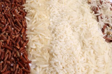 Varity mix long grain basmati medium grain yasemin short grain pilav risotto brown low glycaemic index GI rice in the rows top view
