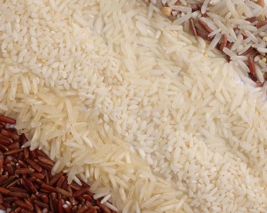 Varity mix long grain basmati medium grain yasemin short grain pilav risotto brown low glycaemic index GI rice in the rows top view