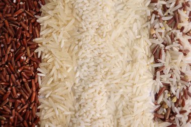 Varity mix long grain basmati medium grain yasemin short grain pilav risotto brown low glycaemic index GI rice in the rows top view