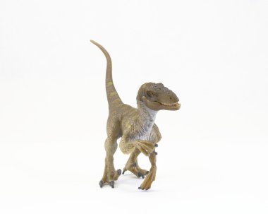 Velociraptor Dinosaur toy clipart