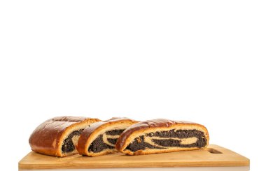 Haşhaş tohumlu kek, parçalara bölünmüş, makro, üst manzara.