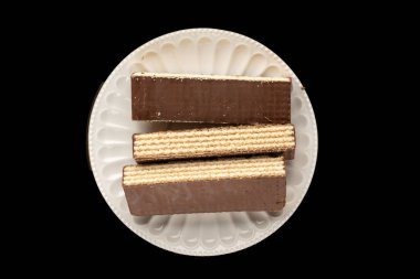 Çikolatalı gofretler parçalara bölünmüş, üst manzara, makro.
