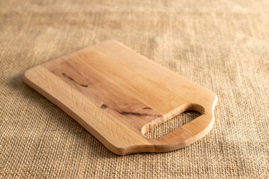 Ahşap mutfak tahtası jüt bez, makro.