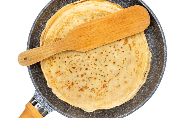 Beyaz arka planda tavada tatlı gözlemeler, üst manzara, yakın plan..