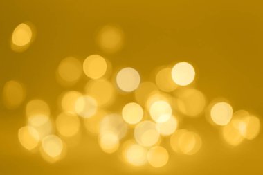 Doğal altın bokeh ışıkları, Noel ya da yeni yıl bulanık arkaplan 