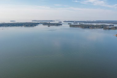 photo from a drone on a sunny morning Gulf of Finland and a sailing boat.