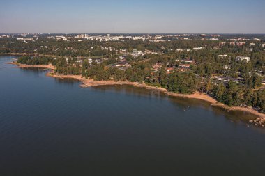 Finland Espoo. July 14, 2021. Photo from a drone on a sunny morning of the coastal part of the beach in the Gulf of Finland. Scandinavian nature