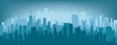 Gün doğumunda şehrin silueti.