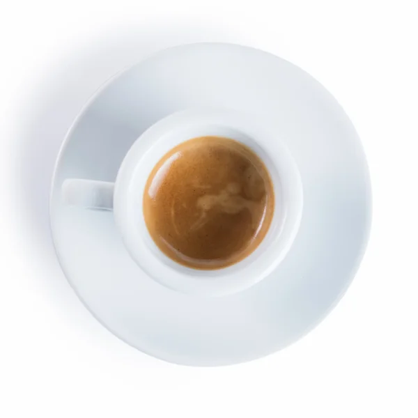 Kopje koffie op een schotel en lepel geïsoleerd op een witte pagina — Stockfoto