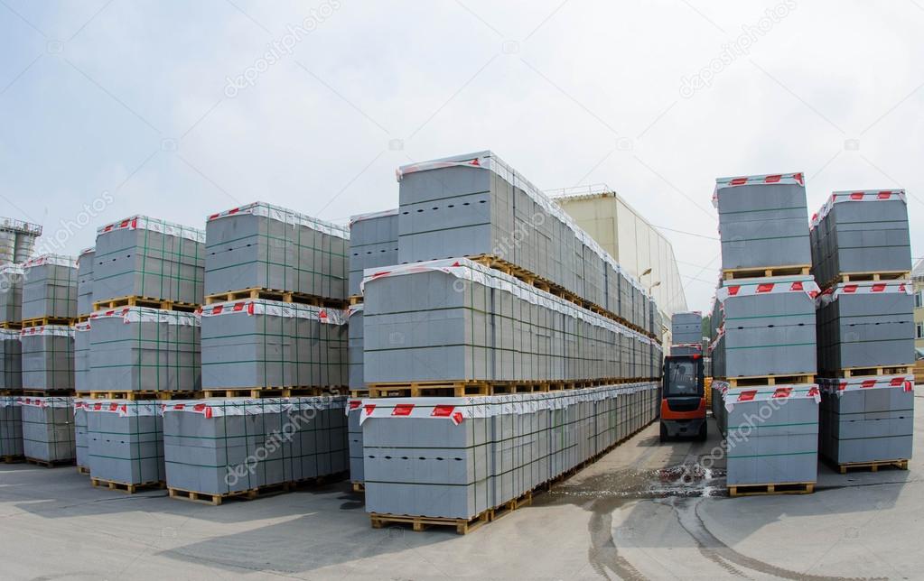 Forklift trucks in stock concrete blocks