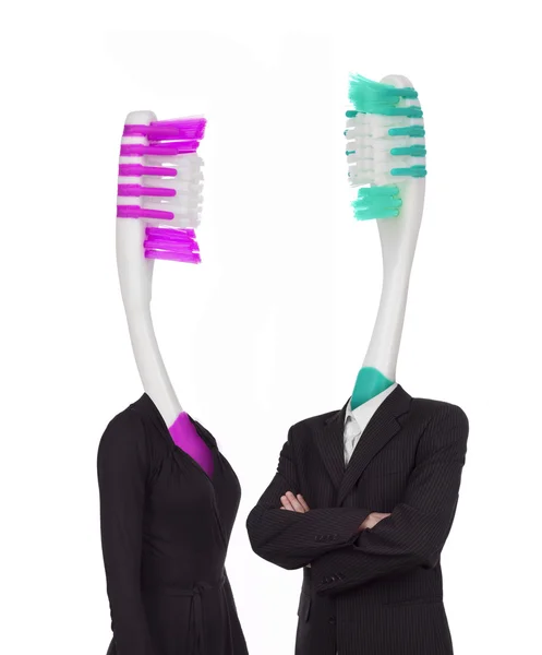 两把牙刷穿着的衣服。概念的照片 — 图库照片
