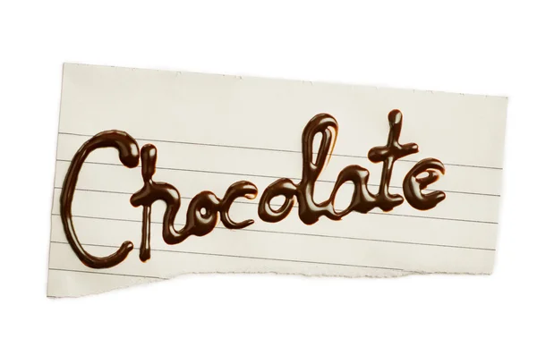 Надпись шоколад на листе бумаги — стоковое фото