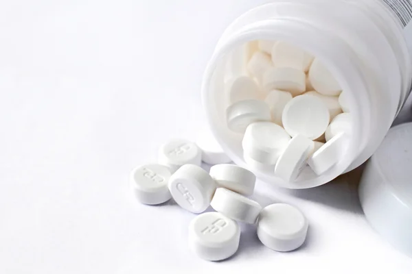 Oral medicine, paracetamol,white pills. Royalty Free Stock Images