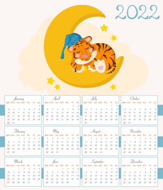 2022 yılı takviminde Ay 'da uyuyan bir kaplan yavrusu resmi ve pençesinde bir yıldız var. Çin takvimine göre yeni yıl 2022. Kaplanların Yılı. Çocuklar çok tatlı. 