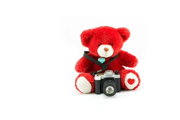 Muñeca oso rojo con cámara de juguete aislado en blanco — Foto de Stock