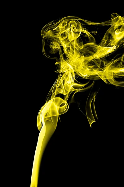 Humo amarillo sobre fondo negro —  Fotos de Stock