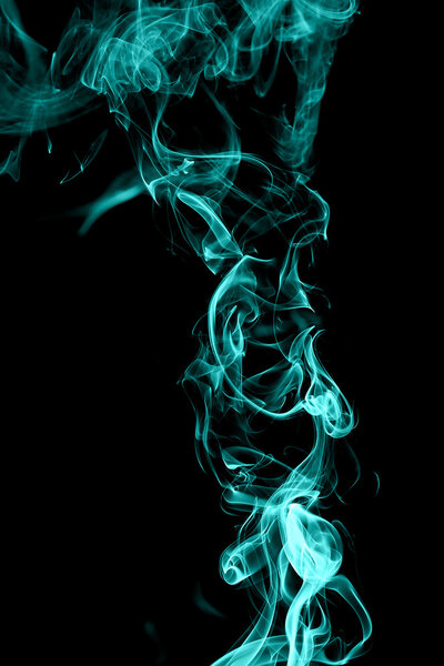 Abstract cyan smoke on white background from the incense sticks