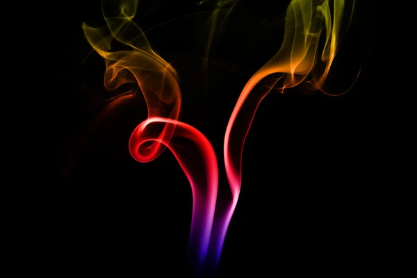 Abstract colorful smoke on black background — Stock Photo, Image