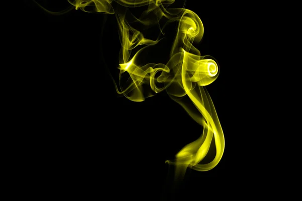 Abstrato fumo amarelo sobre fundo preto — Fotografia de Stock