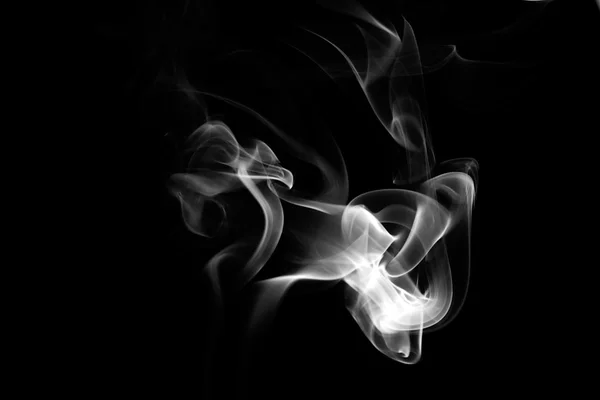 Abstrato fumaça branca sobre fundo preto — Fotografia de Stock