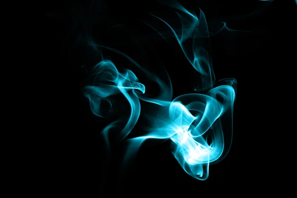 Abstract cyan smoke on black background Stock Picture