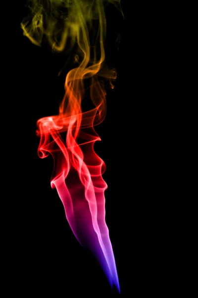 Abstrato fumaça colorida no fundo preto — Fotografia de Stock
