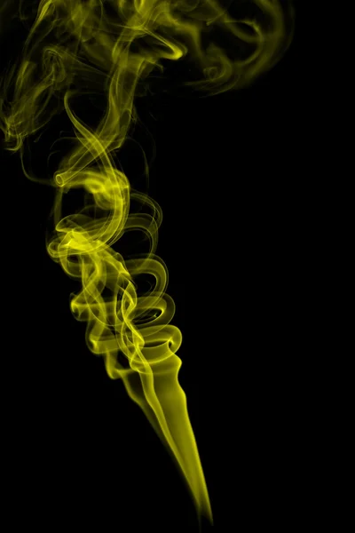 Abstract yellow smoke on black background — Stock Photo, Image