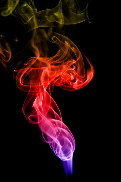 Abstract colorful smoke on black background Stock Photo