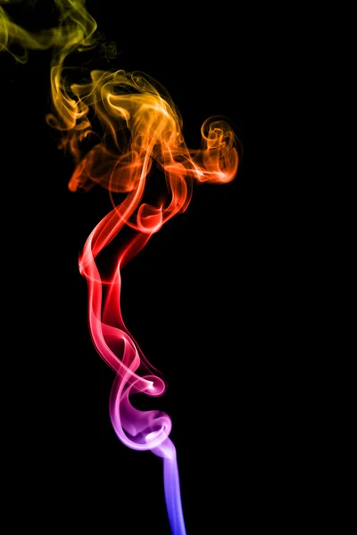 Abstract colorful smoke on black background Stock Picture