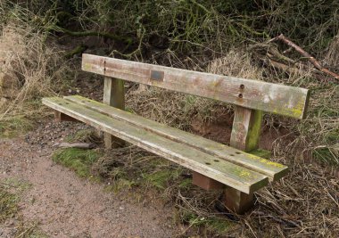 dünyevi renkleri ile eski yıpranmış sıkıntılı ahşap Bank