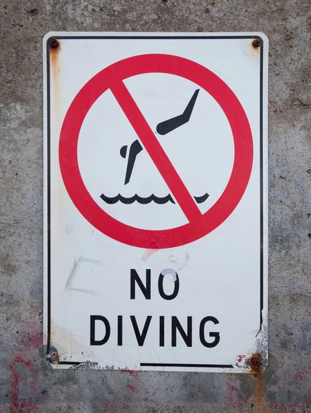 weathered no diving sign