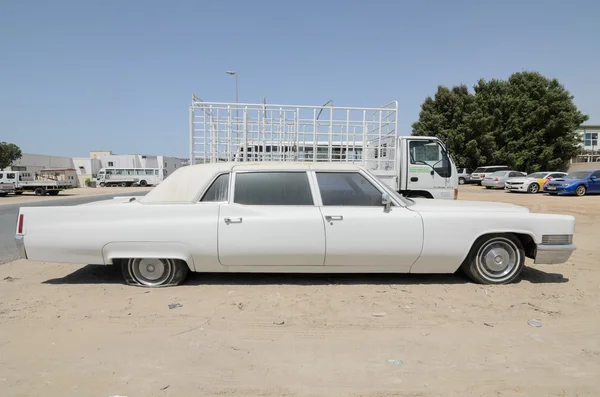 Vintage american Cadillac fleetwood limousine left abandoned - dubai - october 2015 — Stock Photo, Image