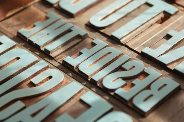 Blocchi di lettere tipografiche con vernice blu — Foto Stock