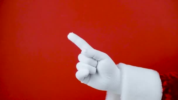 Fotografie rukou v rukavicích Santa Claus v ukazujícím gestu — Stock video