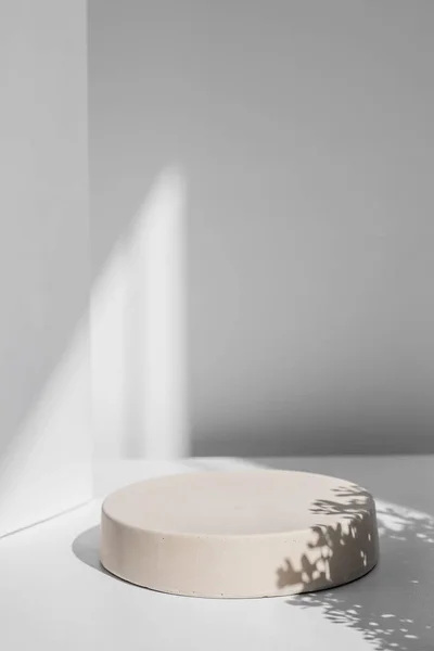 Abstract minimal scene with geometrical form. Cylinder podiums in white colors. Abstract background. Scene to show cosmetic podructs. Showcase, display case. 3d render.
