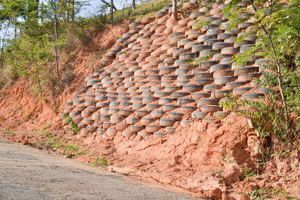 Controlling erosion and mudslide  with tires